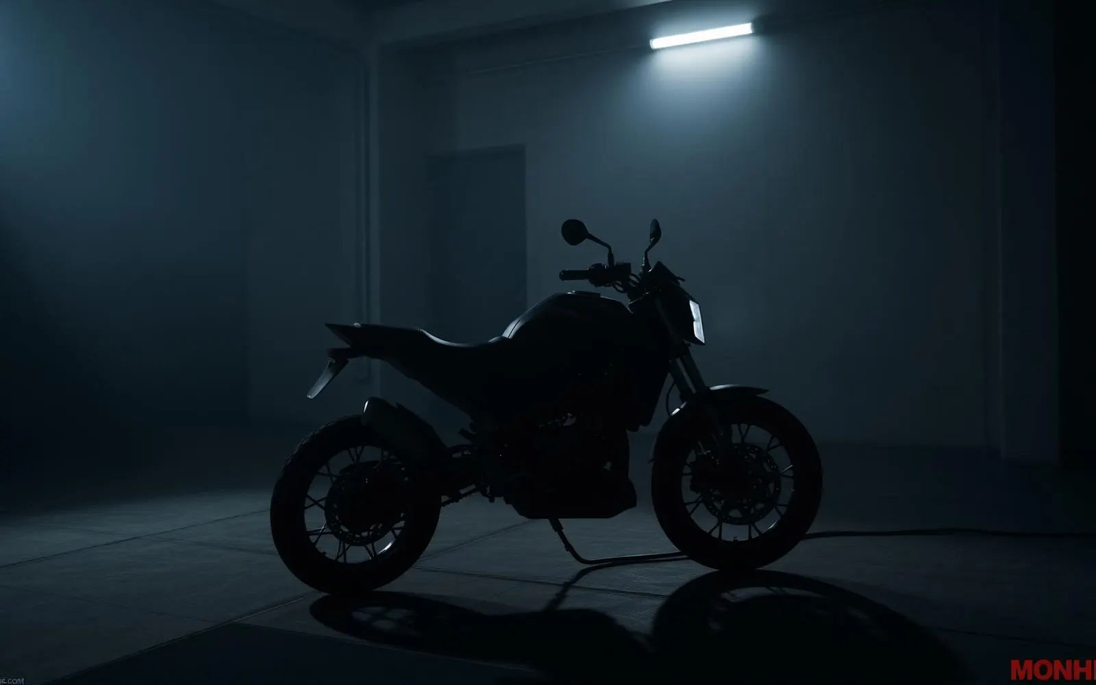 Electric motorcycle charging in a dark workshop